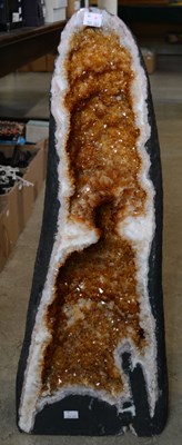 Lot 476 - A citrine geode specimen, with a deep orange...