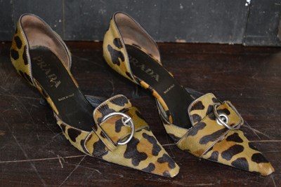 Lot 473 - A pair of Prada pony hair leopard print mules,...