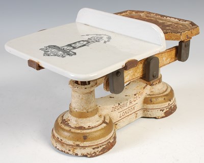 Lot 470 - A 20th century cast iron counter scale, with a...