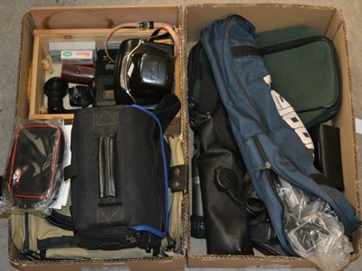 Lot 600 - Two boxes of assorted vintage camera equipment,...