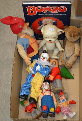 Lot 618 - A box of assorted vintage toys, to include the...