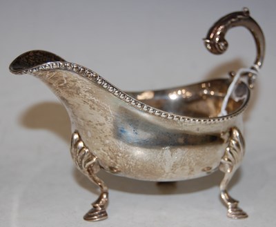 Lot 107 - A George III silver sauce boat, London,...