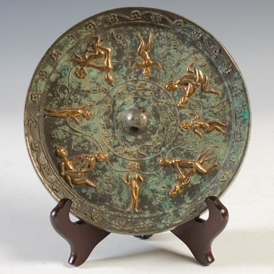Lot 508 - A Chinese bronze mirror, Tang Dynasty style,...
