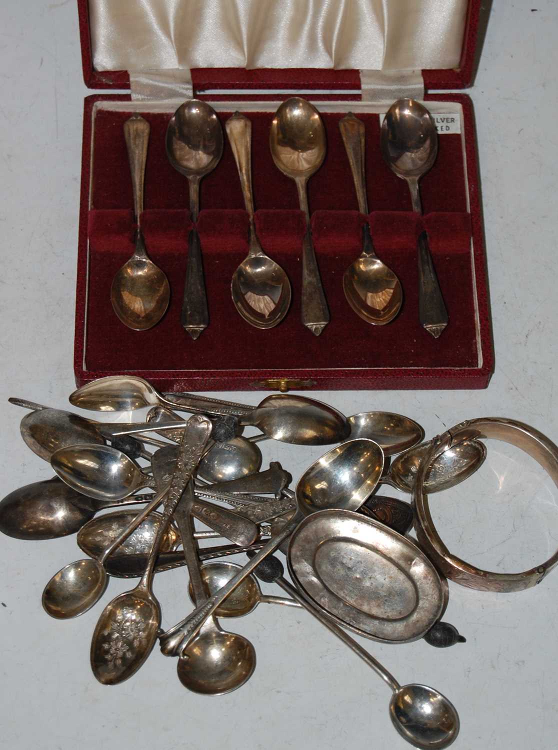 Lot 144 - A cased set of six Sheffield silver teaspoons,...