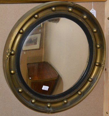 Lot 811 - A 20th century Regency style round gilt wall...