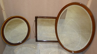 Lot 815 - A group of three 20th century wall mirrors, to...