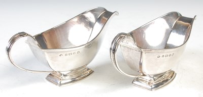 Lot 109 - A pair of Art Deco Birmingham silver sauce...