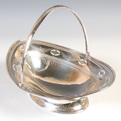 Lot 117 - A George III silver cake basket, boat shaped,...