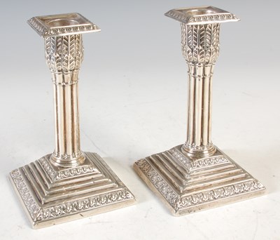 Lot 132 - A pair of London silver cluster column desk...