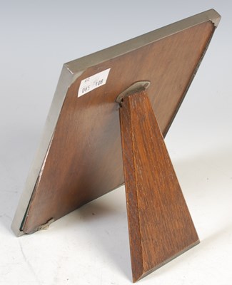 Lot 140 - A pewter mounted rectangular easel photograph...