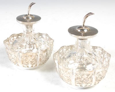 Lot 133 - A pair of silver mounted cut glass oil bottles,...