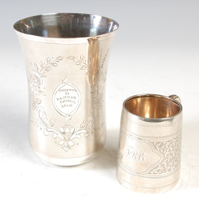 Lot 125 - An engraved silver tapering christening mug,...