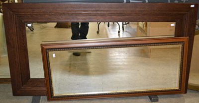 Lot 818 - A darkwood framed rectangular over mantle...