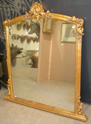 Lot 819 - A 20th century gilt frame over mantle mirror,...