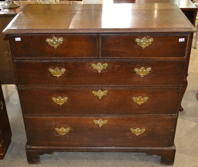 Lot 903 - A Georgian oak two over three chest of drawers,...