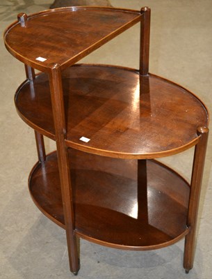 Lot 876 - A 20th century Art Deco three tiered mahogany...