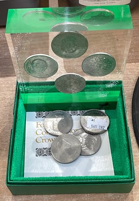 Lot 359 - A group of four commemorative crowns, to...