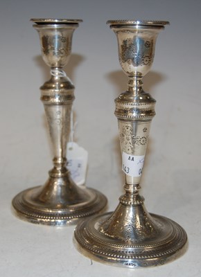 Lot 115 - A pair of Sheffield silver candlesticks,...