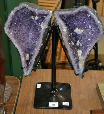 Lot 385 - An amethyst crystal geode cathedral specimen,...
