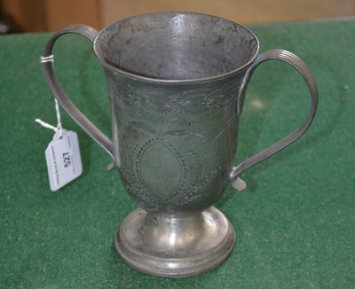 Lot 527 - A late 18th century pewter two handled cup,...