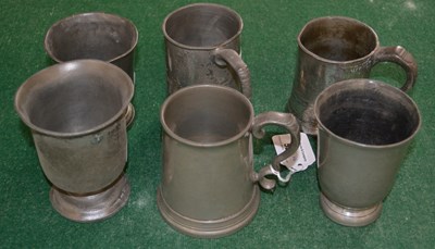 Lot 533 - Three various pewter half pint mugs; together...
