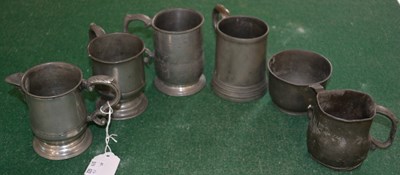 Lot 538 - Three 19th century pewter half pint mugs;...
