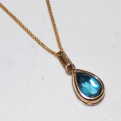 Lot 16 - A 9ct gold pendant necklace, the oval faceted...