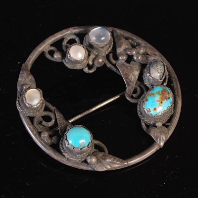Lot 36 - An Arts & Crafts style white metal turquoise...