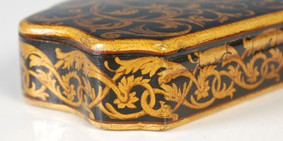 Lot 237 - A Mauchline ware cartouche-shaped snuff box,...