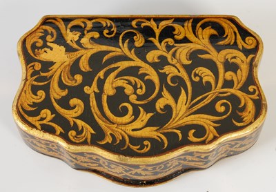 Lot 237 - A Mauchline ware cartouche-shaped snuff box,...