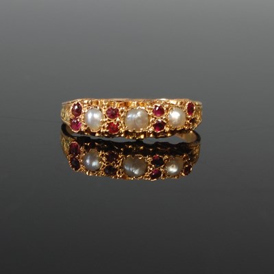 Lot 52 - A 15ct gold split pearl and garnet ring, set...