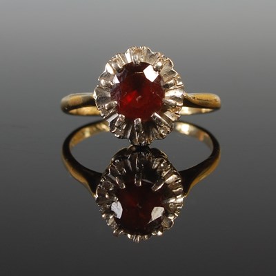 Lot 67 - A yellow and white metal garnet and diamond...