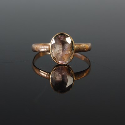 Lot 72 - An antique single stone semi-precious gem set...