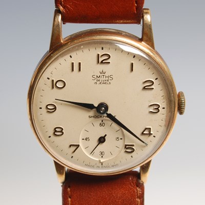 Lot 84 - A vintage Smiths De Luxe 9ct gold gentleman's...