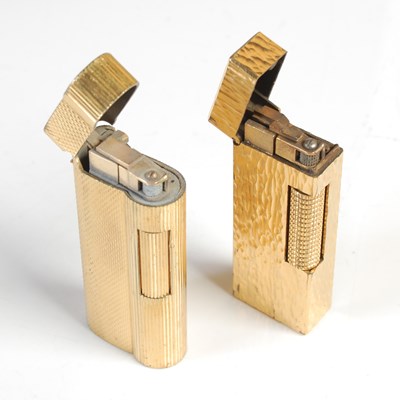 Lot 102 - Two vintage Dunhill gilt metal roller gas...