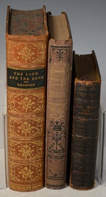 Lot 595 - A collection of three antique books, A bible...
