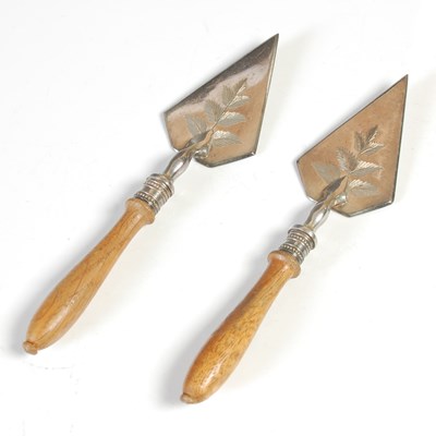 Lot 158 - A pair of miniature electroplated servers, in...