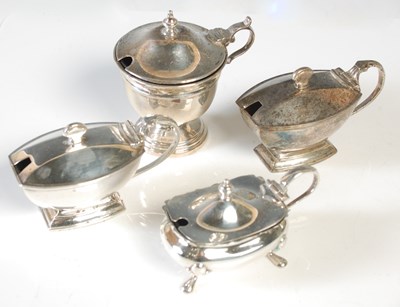 Lot 163 - A group of four assorted silver cruets, the...