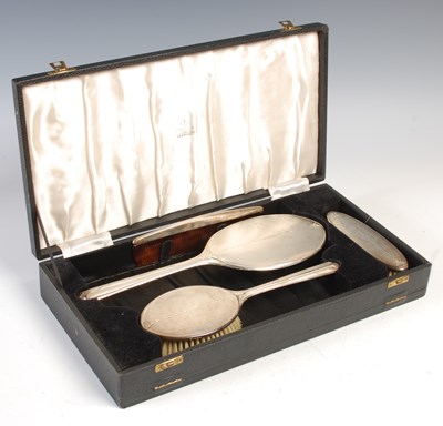 Lot 167B - A Birmingham silver four piece dressing table...