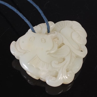 Lot 200 - A Chinese pale celadon jade carving of a...