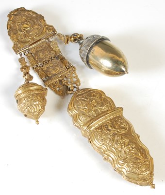 Lot 204 - An antique gilt metal chatelaine, the central...