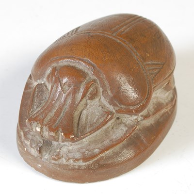Lot 205 - An Egyptian Revival composite paperweight in...