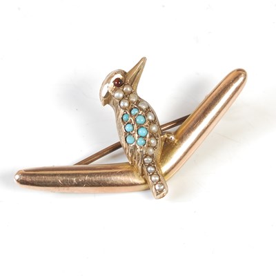 Lot 217 - A yellow metal kookaburra and boomerang brooch,...