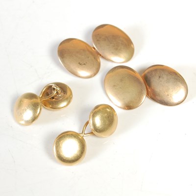 Lot 223 - A pair of yellow metal circular cufflinks,...