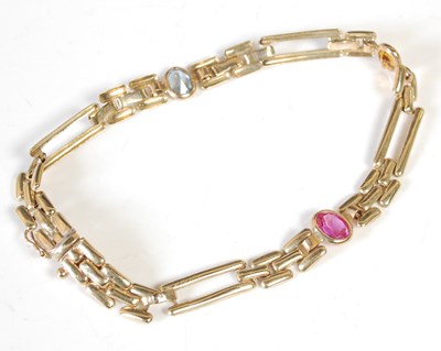 Lot 238 - A 9ct gold bracelet, set with three coloured...