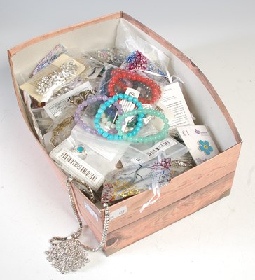 Lot 266 - A box of assorted unopened costume jewellery.