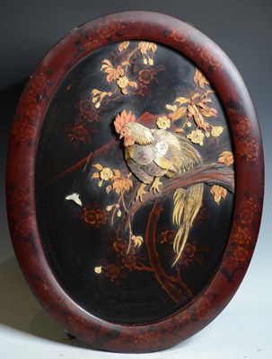 Lot 824 - A Japanese Shibayama style oval wall panel,...