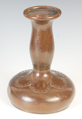 Lot 173 - An Arts & Crafts riveted copper bottle vase