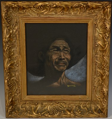 Lot 673 - A 20th century bust portrait of an Asian man,...