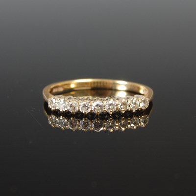 Lot 315 - An 18ct gold and diamond nine stone ring, set...